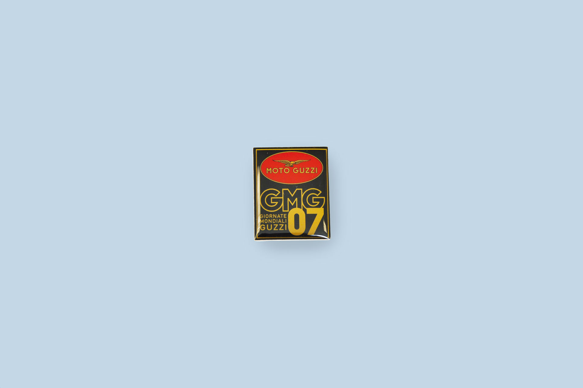 Spilla distintivo tranciato in ottone con stampa superficiale
